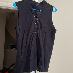 Women’s top; Size Small. “Rockstar” style.